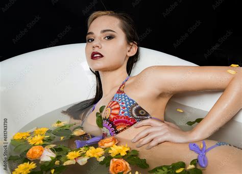 Sexy Woman In Lingerie In A Bath With Flowers And Petals Stock Foto Adobe Stock