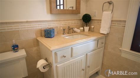 Crema Marfil Marble Vanity In A Elegant Guest Bathroom Marble