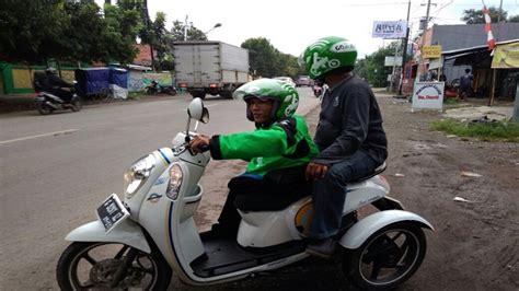 Foto Kisah Sukses Penyandang Difabel Jadi Driver Ojek Online