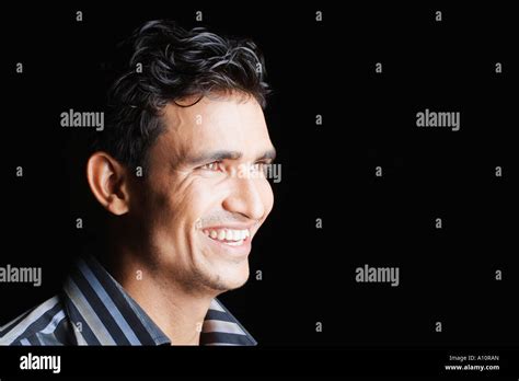 close    young man smiling stock photo alamy