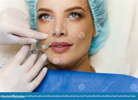 Lips Augmentation Injections For Attractive Girl Plastic Surgeon Does Injection In Lip In