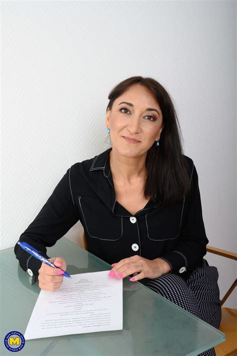 Very Sexy American MILF Karina Fox Exposes Her Body And Bends Over A Bed CoedCherry