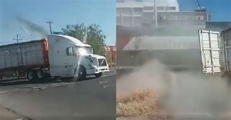 VIDEO Tráiler intenta ganarle el paso al tren y termina destrozado