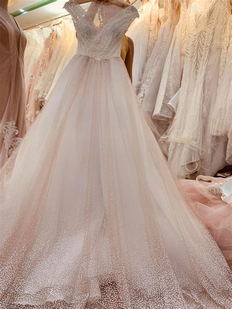 Nude Beige Pink Sleeveless V Neck Lace Or Beaded A Line Wedding Dress With Shimmering Tulle