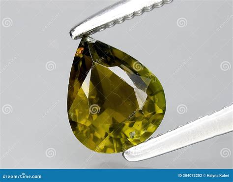 Natural Green Tourmaline Gem on the Background Stock Photo - Image of ...