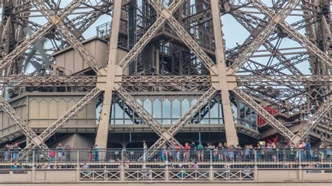 Close Up View Of First Section Of The Eiffel Tower Timelapse In Paris