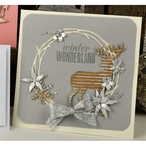 A Card With A Deer And Snowflakes On It Next To Some Other Cards