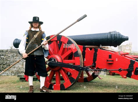 English Civil War Cannon And Gunner 17th Century Historical Stock