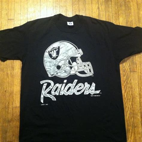 Vintage 1990 Los Angeles Raiders NFL football helmet t-shirt | Defunkd