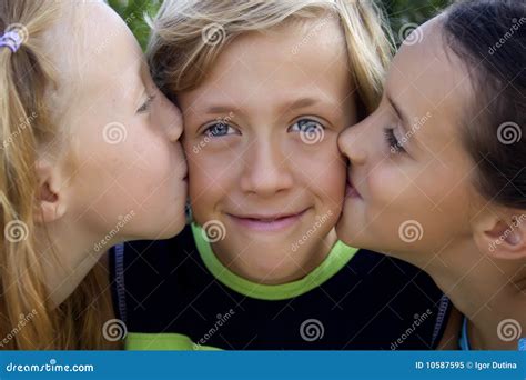 Cute Blonde Boy Kissed By Two Girls Stock Image Image Of Caucasian Male 10587595