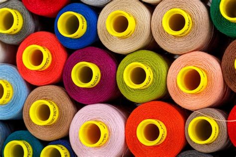 Premium Photo Set Of Multicolored Spools Of Thread For Sewing