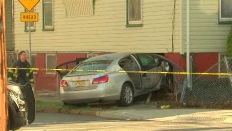 PHOTOS: Newark police chase ends with car into house, suspect shot ...