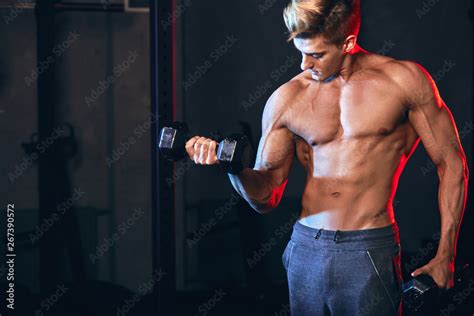 Caucasian Man Working Out In Gym Doing Exercises With Dumbbells At Triceps Strong Male Naked