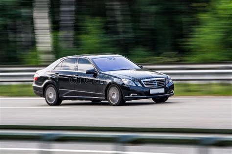 Luxury Mercedes Benz Class Speeding On Empty Highway Editorial Image