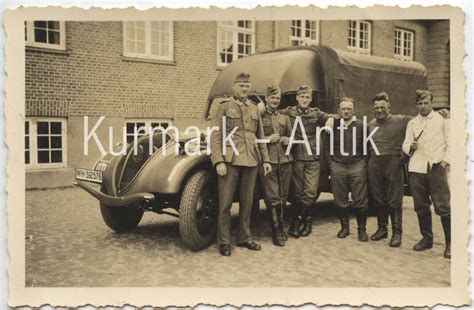 Foto Wehrmacht Frankreich Beute PKW LKW Peugeot Emblem Wappen Postimages