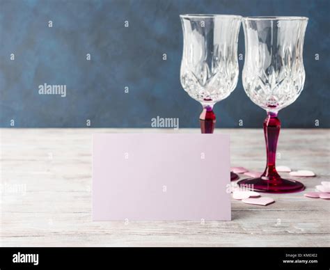 Two Stemmed Champagne Glasses With Pink Hearts Blank Paper Note Card To Fill With Your Text On