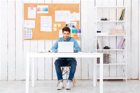 Premium Photo Full Length Portrait Of A Casual Young Man With Laptop