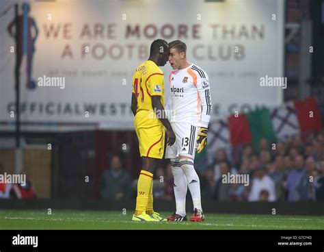 West Ham United S Adrian Right And Liverpool S Mario Balotelli Left