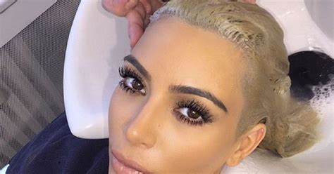 Kim Kardashian Gets Her Platinum Blonde Hair Touched Up While In Paris