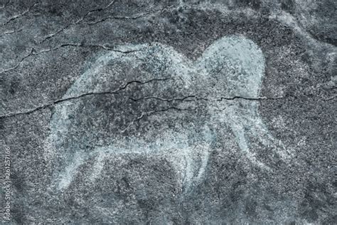 image of an ancient mammoth on the wall of the cave. ancient history ...