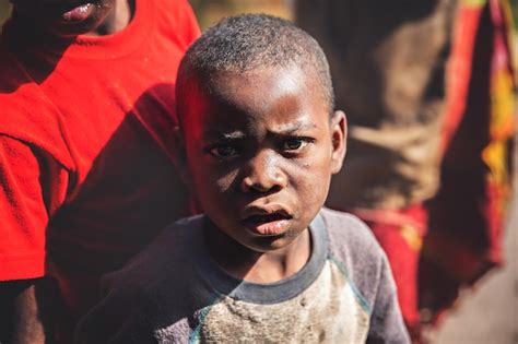 Premium Photo | Portrait of an African boy from Madagascar. Poverty in ...