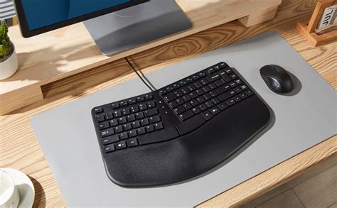 MCSaite Teclado ergonómico compacto USB con cable Teclado dividido