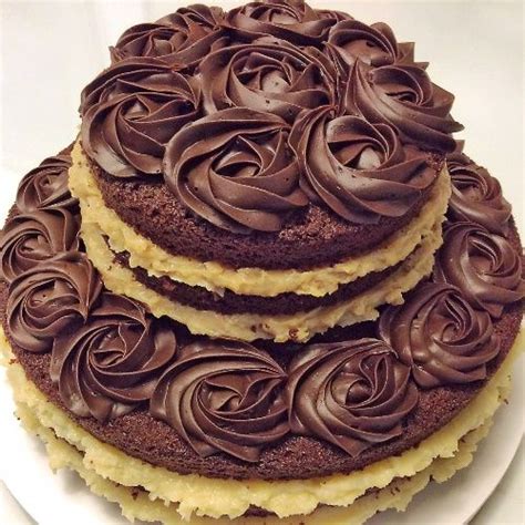 There Are Three Cakes That Have Chocolate Frosting On Them