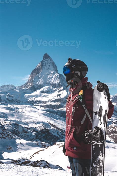 Young snowboarder spending winter holidays in Zermatt, near the famous