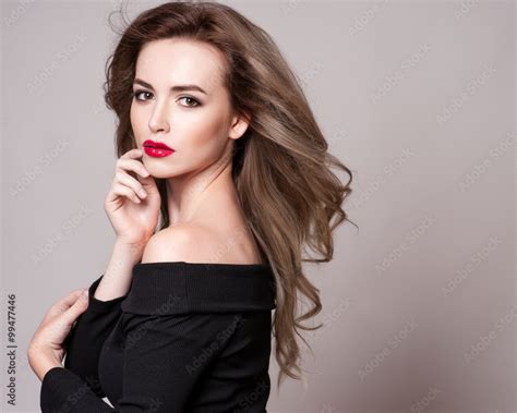 Portrait Of Beautiful Blonde Woman With Curly Hairstyle And Bright Makeup Perfect Skin
