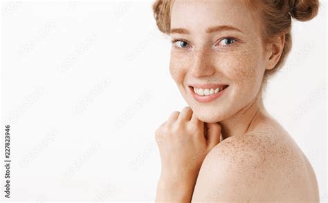 Close Up Shot Of Tender And Feminine Good Looking Ginger Female Standing Naked In Profile