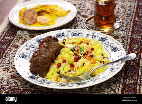 Iranian Cuisine Persian Jeweled Rice And Chicken Fesenjan Potato