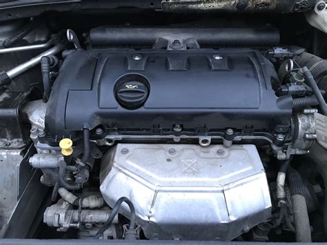 №18 — Замена прокладки клапанной крышки и приводного ремня — Peugeot ...
