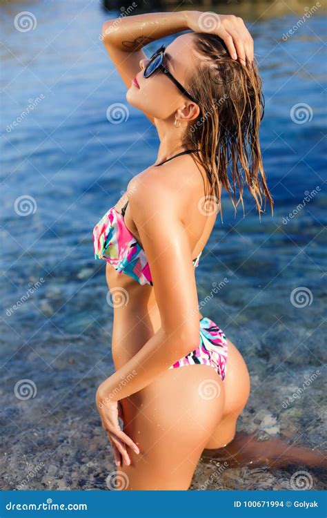 Portrait Of A Beautiful Woman In Bikini In Blue Ocean Water Stock Photo Image Of Babe