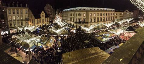 an aerial view of the christmas market at night