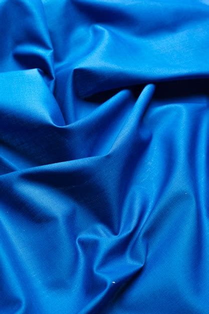 Premium Photo | Blue silk fabric background