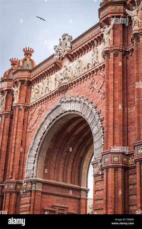 Architectural Close Up Of Monumental Red Brick Arch In Barcelona Spain