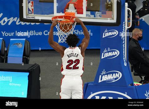 Orlando, Florida, USA, Miami Heat player Jimmy Butler #22 makes a dunk ...