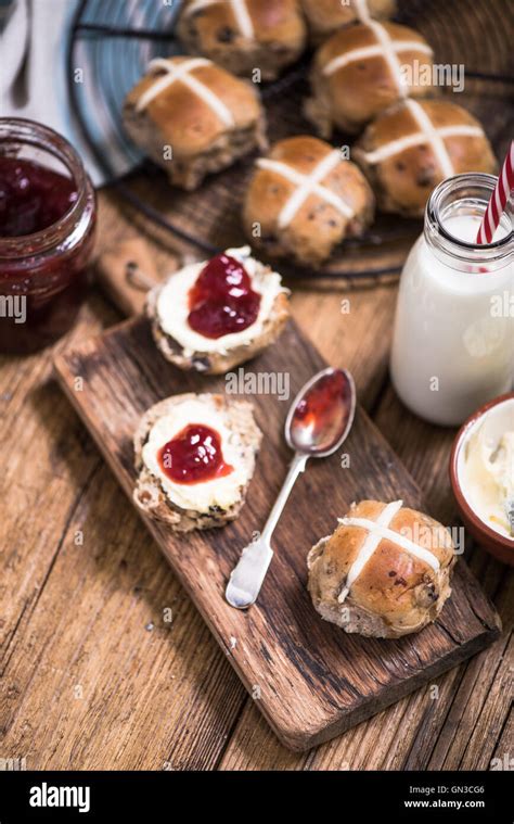 Creamy Tea Hot Cross Bun With Jam And Clotted Cream Stock Photo Alamy