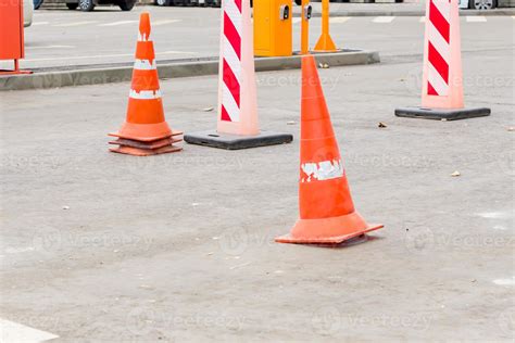 traffic cones in the middle of the street. traffic safety and roadwork ...