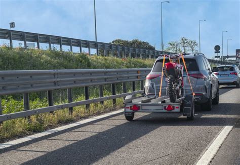 Secure Your Ride How To Strap A Motorcycle To A Trailer For Safe