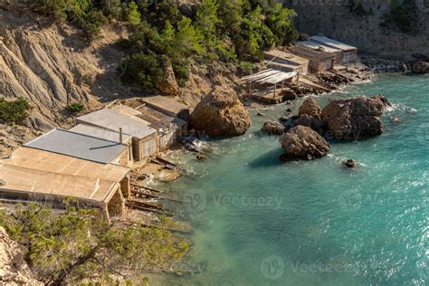 Turquoise waters in Es Portitxol, Ibiza, Spain. Hidden bay on the