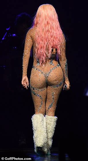 Karol G Flaunts Her Jaw Dropping Figure In A Dazzling Nude Catsuit As She Performs At The O2