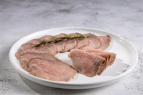 Premium Photo Sliced Roast Beef On Plate