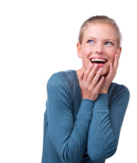 Wow A Studio Shot Of A Beautiful Young Woman Looking Surprised Stock