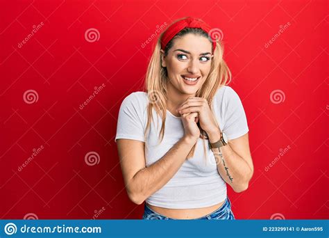 Young Caucasian Woman Wearing Casual White T Shirt Laughing Nervous And