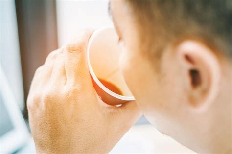 Premium Photo Close Up Portrait Of Man Drinking Glass