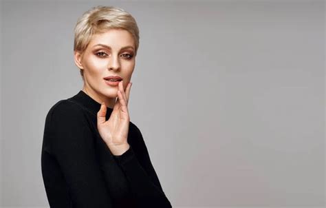 Sexy Woman Blonde Short Hair Looking Camera Isolated Gray Background Stock Photo By Kiuikson