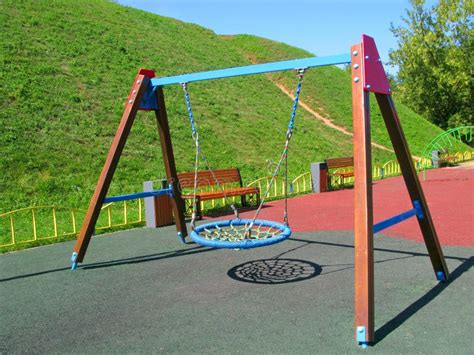 Park Swings - Childrens Playground Stock Photo - Image of color, houses ...