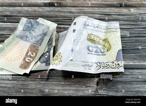 Crumpled Egyptian Le Twenty Pounds And Saudi Arabia Money Of Sar