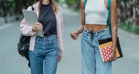 Students friends walking on street in daytime · Free Stock Photo